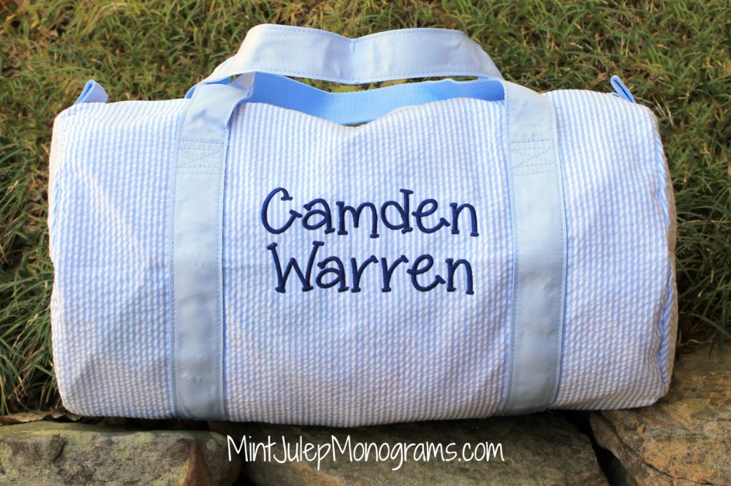 baby blue seersucker duffel bag name Camden Warren embroidered in navy in the Charlie font