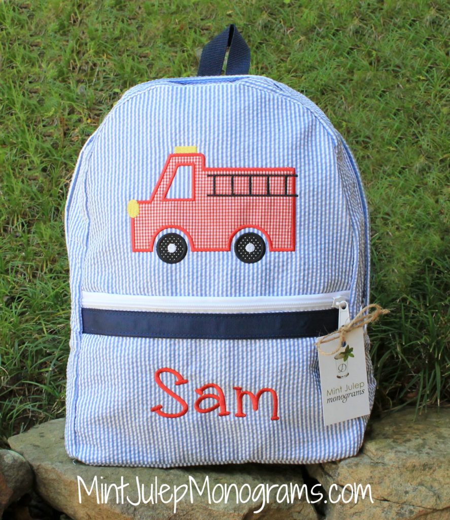 Large Backpack, Navy Seersucker with Firetruck Applique, 
Lipstick Red thread, Charlie font