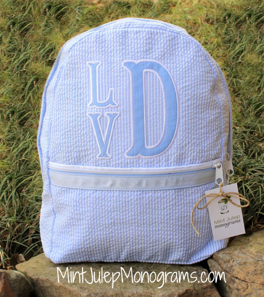 baby blue seersucker custom applique large backpack, fishtail applique font, white thread, blue dot fabric