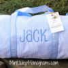 baby blue seersucker baby duffel bag matching blue thread with jack in pearson font