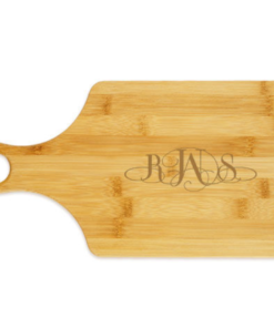 engraved paddle cutting board with monogram